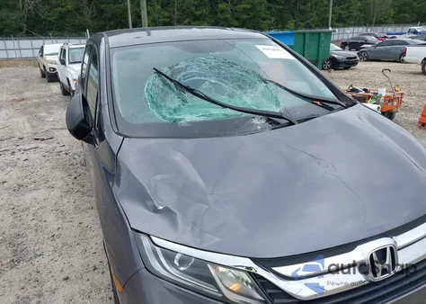 2019 Honda Odyssey Lx z USA, uszkodzony, nr VIN 5FNRL6H24KB127877